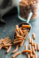 Dried rigatoni pasta.