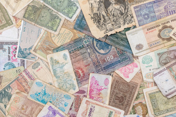 Old world paper money of different countries as background