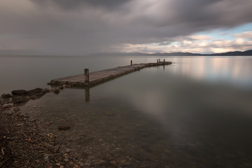 Long exposure shot of a pier in very high water