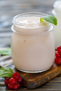 Sour baked milk in a glass jar.