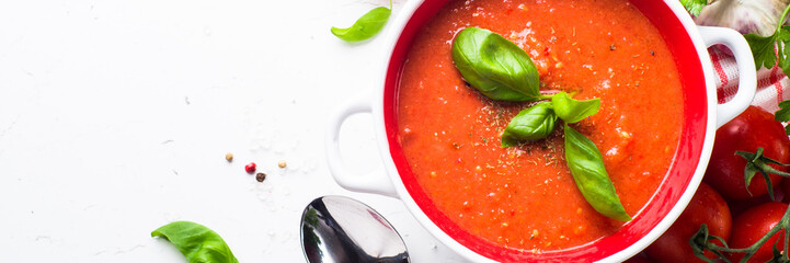 Tomato soup  on white. Long banner format.