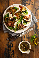 Summer caprese salad with grilled eggplant