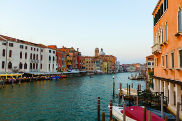 Fototapeta na wymiar Canal with gondola in Venice, Italy. Architecture and landmarks of Venice. Venice postcard with Venice gondolas