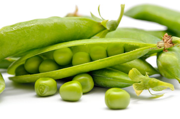 Pods of green peas isolated on a white background. Green, ripe, fresh vegetables. Legumes.