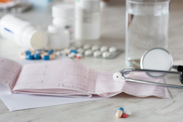 medicine  stethoscope and electrocardiogram,