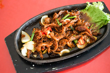 Stewed cobra snake in english Worcester sauce with vegetable extreme food cuisine
