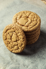 Biscuit sweet cookie background. Domestic stacked butter biscuit pattern concept,close up macro.Homemade cookies on wooden table.Cereal biscuits with the sesame,peanuts,sunflower and amaranth.