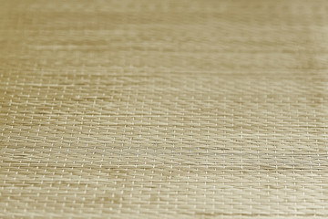 Yellow straw decorative mat background texture