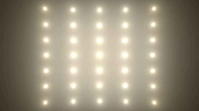 Flood lights disco background. Bright white spotlight bulbs is flashing