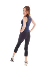 Fototapeta premium Woman standing in exercising outfit from back