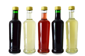 White, rose, and red wine bottles  isolated on white background