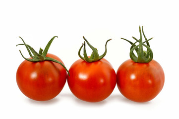 Fresh tomatoes isolated on white background