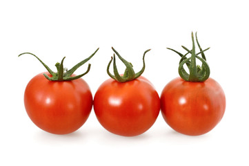 Fresh tomatoes isolated on white