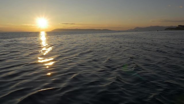 Sundown sailling the sea