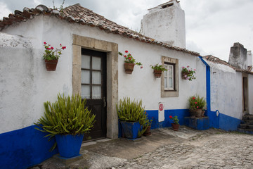 Fototapeta na wymiar Traditional Medieval Street in Obidos, Portugal