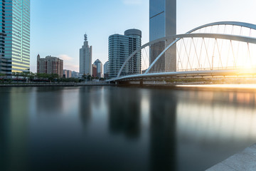 Tianjin city waterfront downtown skyline with Haihe river,China.