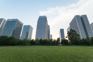 city downtown district with green lawn,dalian city,china.