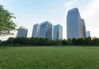 city downtown district with green lawn,dalian city,china.