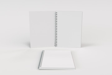 Two notebooks with spiral bound on white background