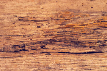 Rough old rustic wooden plank background with cracks