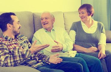 Grandparents and grandson talk