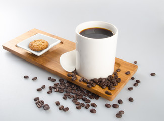 coffee or cup of coffee and cookie on background.
