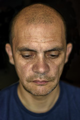 Fototapeta premium Portrait of a man on a dark background