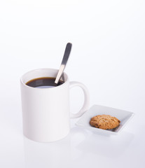 coffee or coffee with cookies on background.