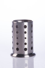 Kitchen utensils holder on background.