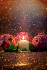 Vintage image style on pink  water lily or lotus flower folding thai style with white candle light  for worship with red bokeh background