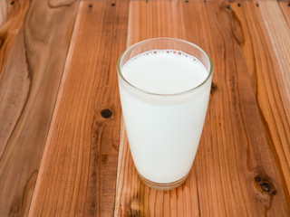 milk glass on wood table
