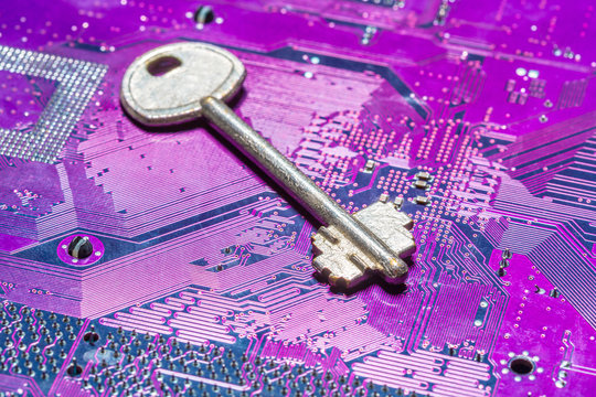 Close up of key on computer circuit board