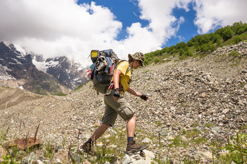 Obraz premium Happy hiker enjoy beautiful mountains. Relax summer time