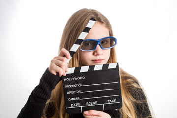 Teenage girl with clapperboard