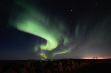 Aurora borealis, rocky dyke, Gardur, Iceland