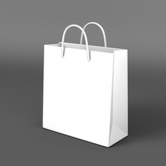 White blank shopping paper bag isolated on grey background for mock up and template design. 3d...