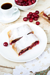 Strudel with a cherry. Cherry pie.