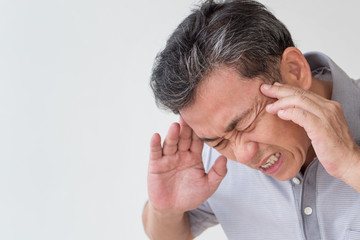 sick old senior man headache, dizzyness, sinus inflammation, stress, migraine