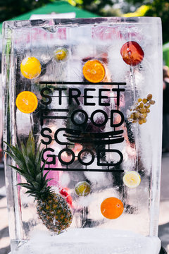 Piece of ice with lettering ' Street food'