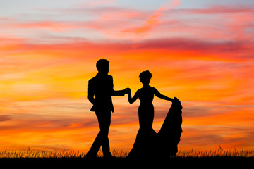 Fototapeta na wymiar Just Married silhouette at sunset