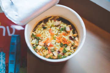Close up Noodle cup with a Plastic Fork.