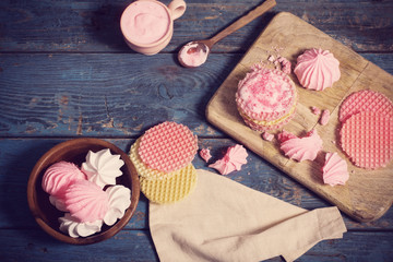pink dessert on old dark wooden table