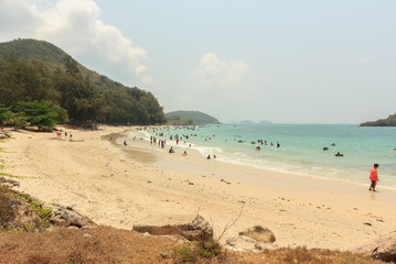 Many tourists enjoy swimming in the sea.