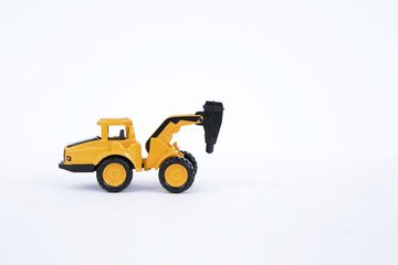 Yellow drill truck isolate on white background, child toy car model