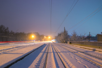 beautiful long railway on the nature of winter at night