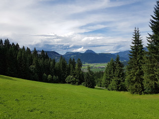 Fototapeta na wymiar St. Johann, Ort, Urlaubsort, Kitzbueheler Alpen