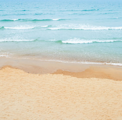 Fototapeta na wymiar Sandy beach and sea. Abstract background