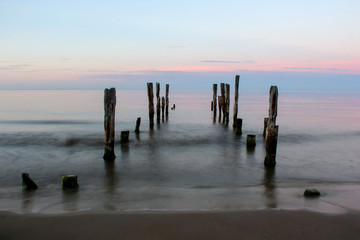 The pier on baltic sea, Melnsils, Latvia in sunrise