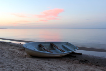 Baltic Sea and a fishing boat in Melnsils, Latvia