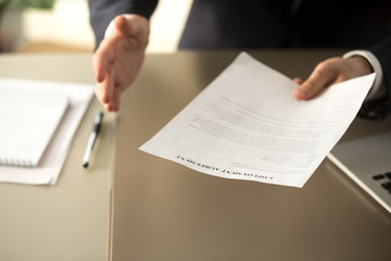 Close up view of employer offering work, businessman extending agreement for signing to successful...
